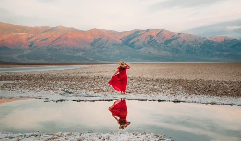 Woman in red dress in travel destination